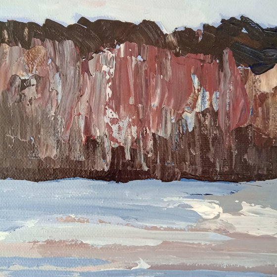 Beach and rock cliffs at Torbay