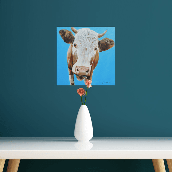 Cow portrait painting in blue