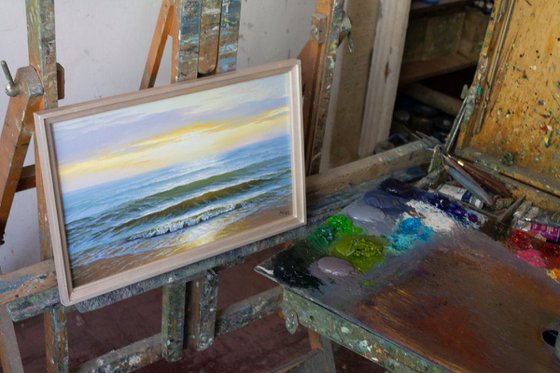SUNRISE ABOVE THE WAVES