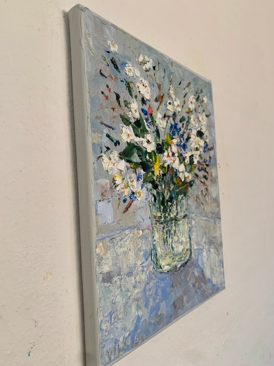 Still life with daisies and cornflowers