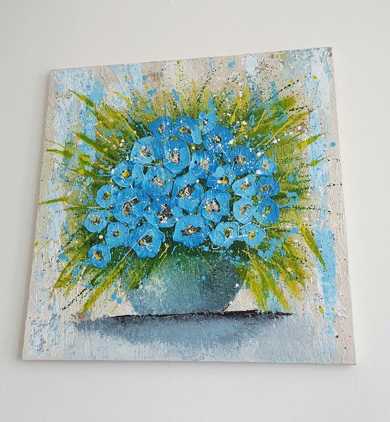 VASE OF BLUE FLOWERS