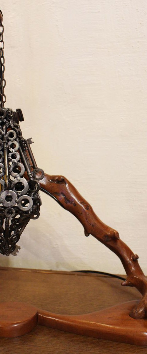Hanging key lamp by Jonathan Pradillon