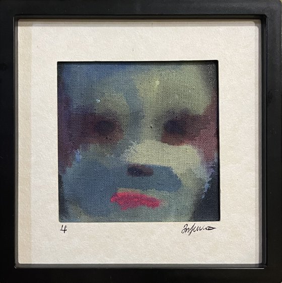 A Face Held in Colour