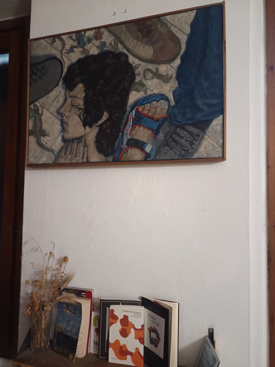 Sleeping on the sidewalk.