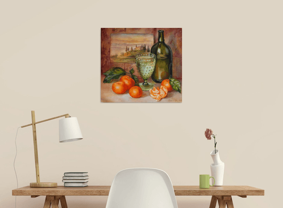 Still life with a green bottle and tangerines