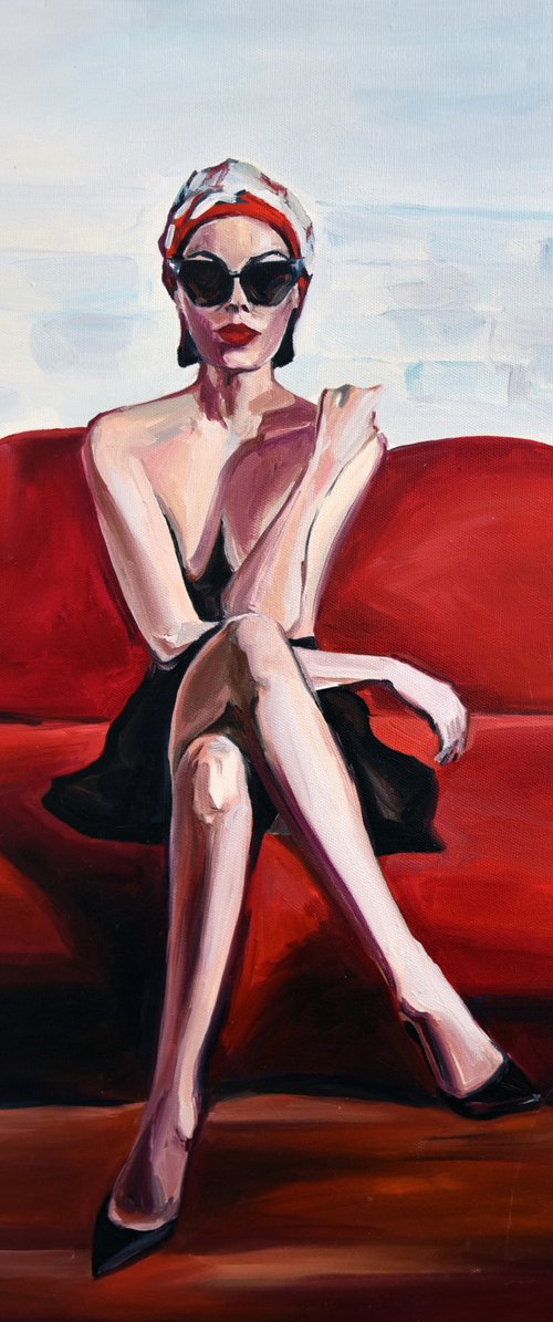 Elegant Woman on Red Couch by Sasha Robinson