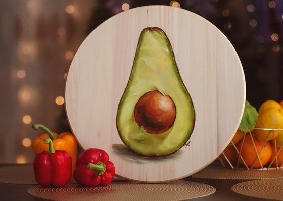 Rotating round wooden tray with avocado