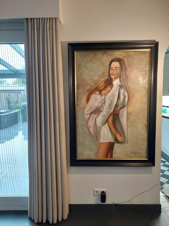 Mother holding her child