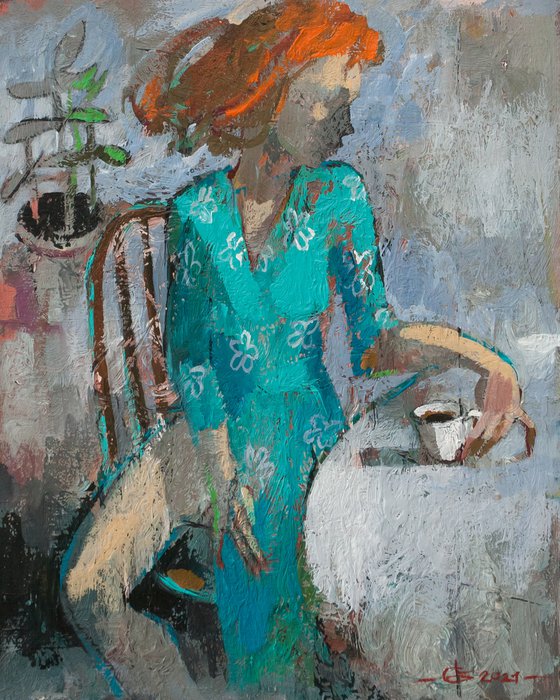 Morning coffee in a turquoise blouse
