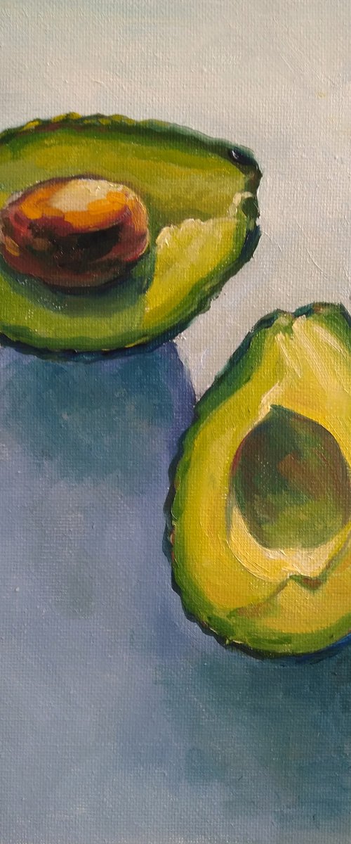 Halved avocado by Alfia Koral