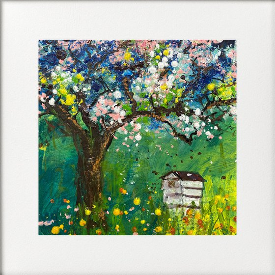 Beehive in orchard framed