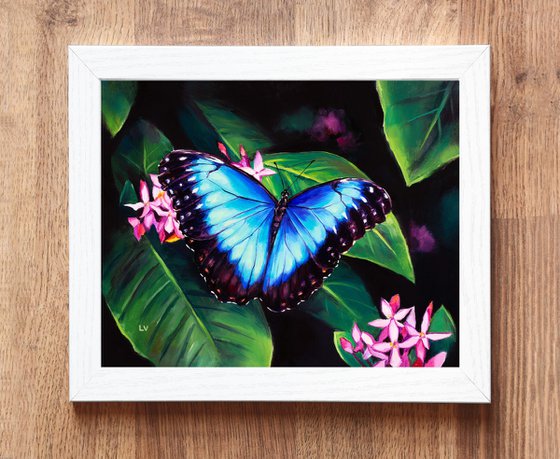 Blue butterfly and pink flowers
