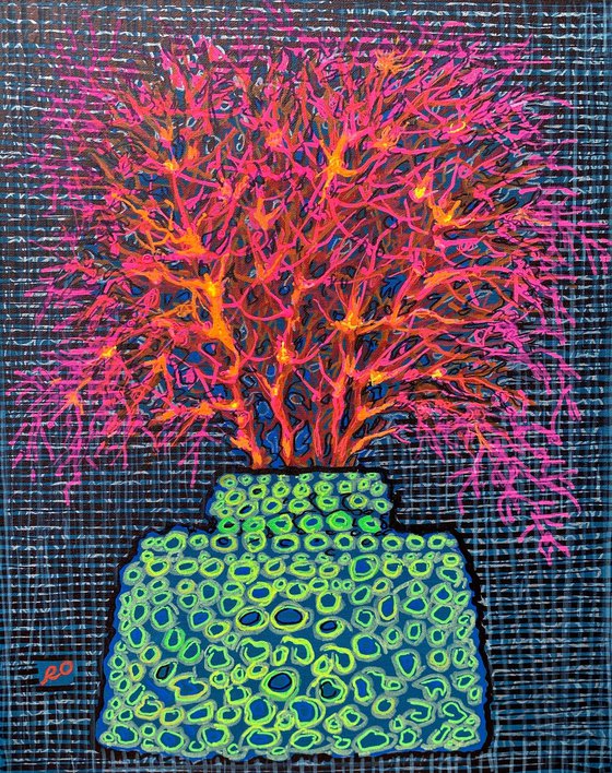 Pink coral in a green vase