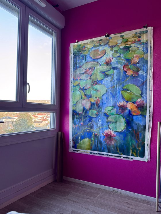 Water lilies on blue water