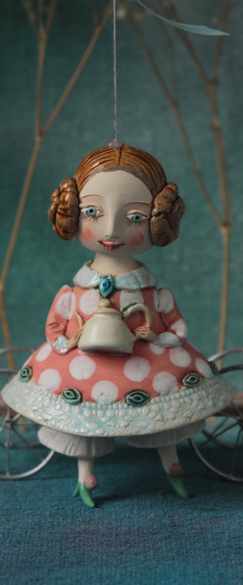 Little Girl with a teapot. Hanging sculpture, bell doll by Elya Yalonetski by Elya Yalonetski