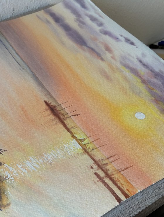 Serene Sunset over a Seaside Town