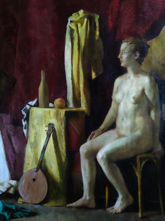 Nude staging with a guitar