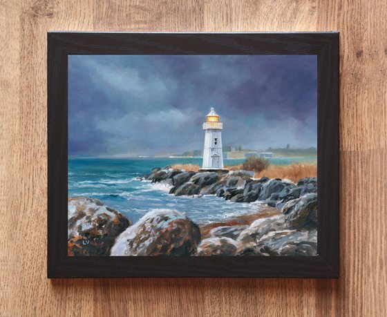 Lighthouse in blue-gray sky