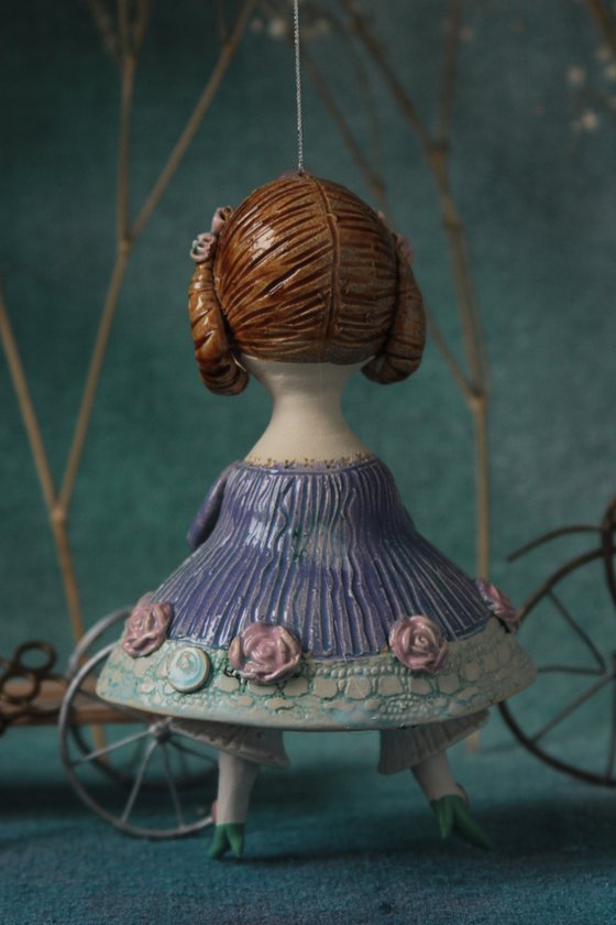 Little Girl in an blue dress with a teddy. Hanging sculpture, bell doll by Elya Yalonetski