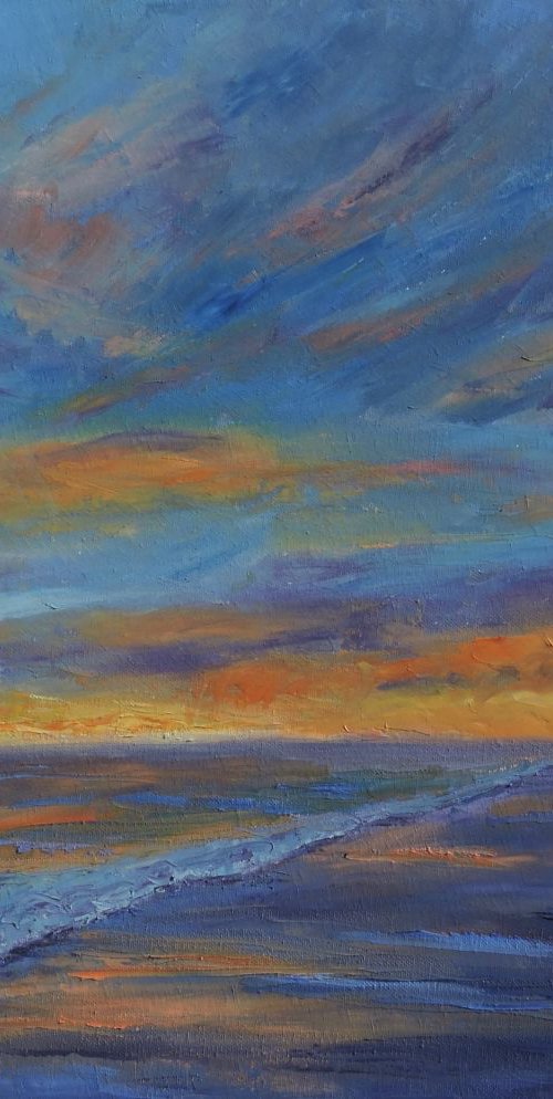 Sunset over the ocean by Linda Mooney