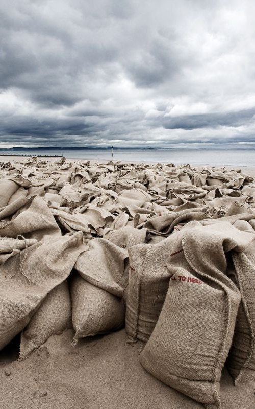 Sandbags on Portobello Beach, edition 3 of 5 by Douglas Kurn