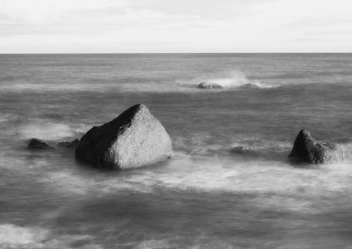 Rocks and Incoming Tide [Framed; also available unframed] by Charles Brabin