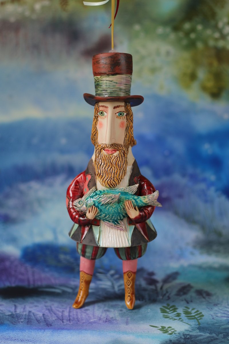 Gentleman holding a fish. Hanging sculpture, Bell-doll by Elya Yalonetski