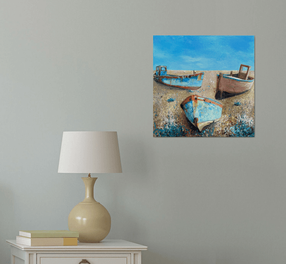 Three boats on the beach