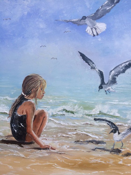 Girl and a seagulls