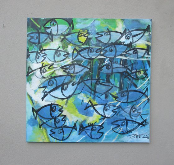 blue fishes jumping