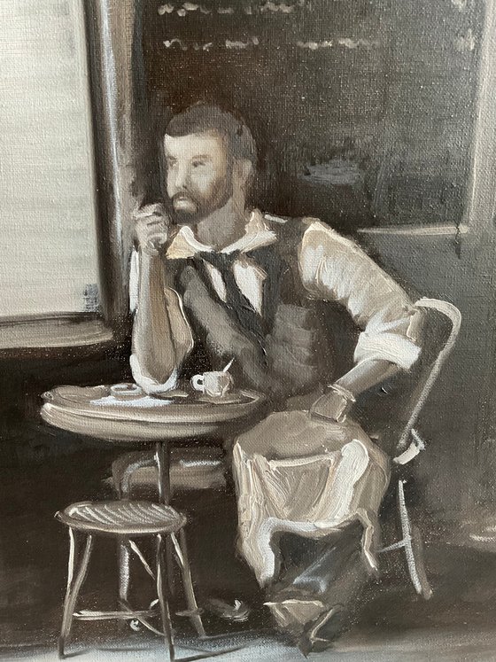 Waiter in cafe on a break