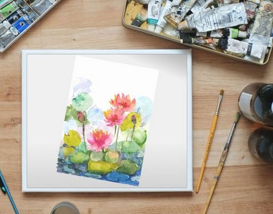 Three water lilies in a pond