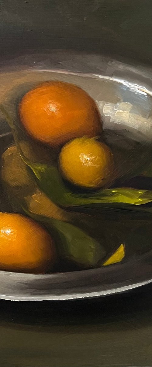 Citrus on a pewter plate by Susie Cornwall