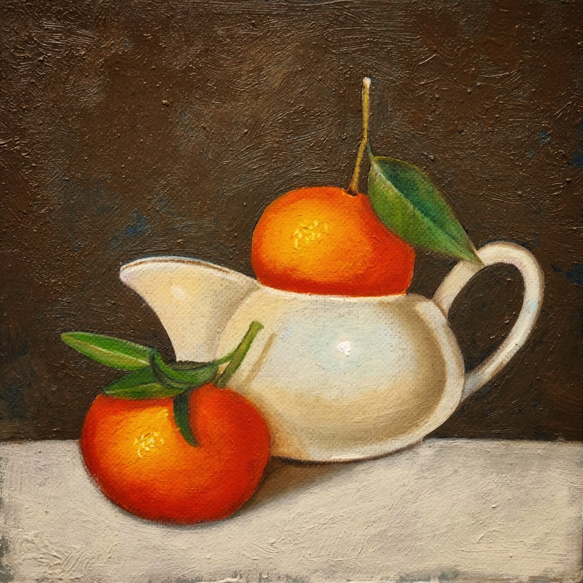 Oranges in Milk jug by Priyanka Singh
