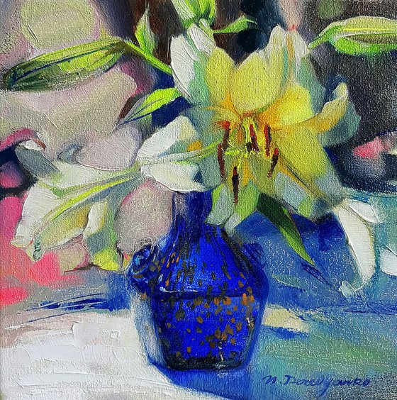 Lily in a blue vase