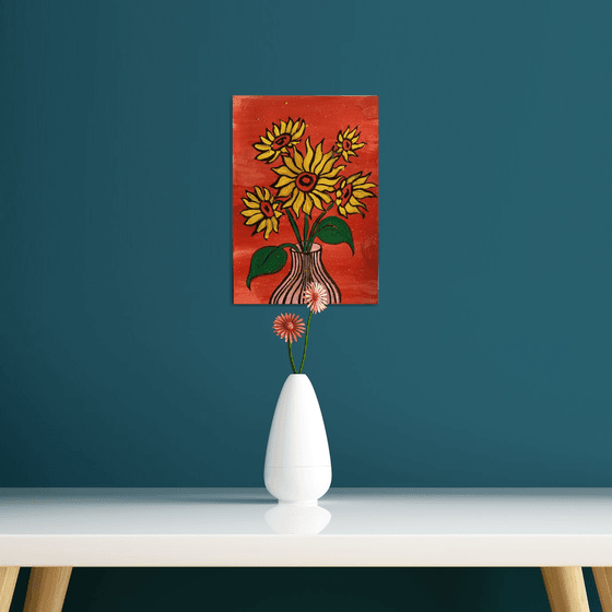 Sunflowers in vase on Red