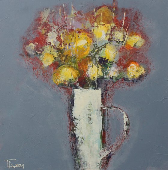 Flowers in a white jug.