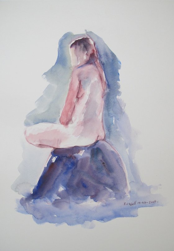 Seated female nude back view