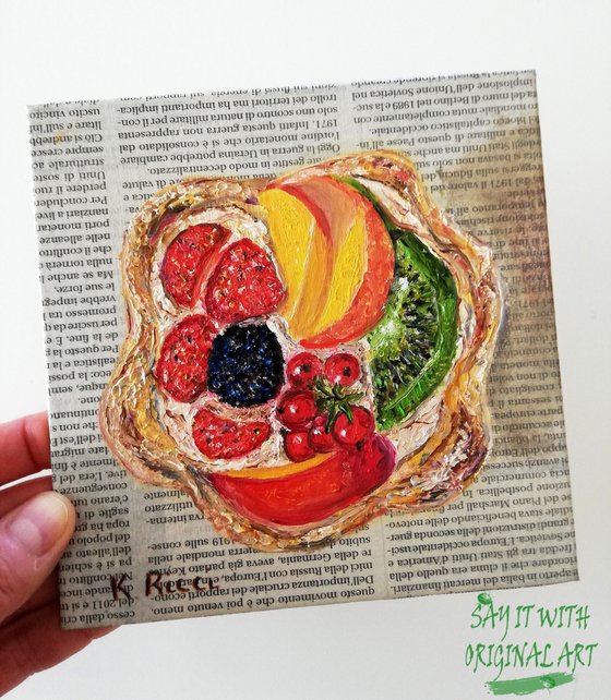 "Fruit Tart on Newspaper"