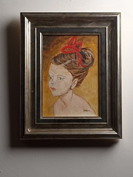 girl with red ribbon