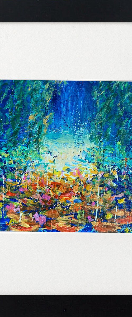 Deep Blue Waterlily pond framed by Teresa Tanner