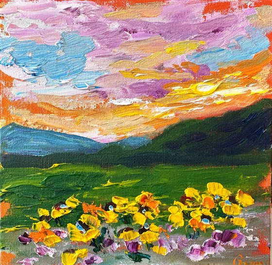 Orange sunset with flowers