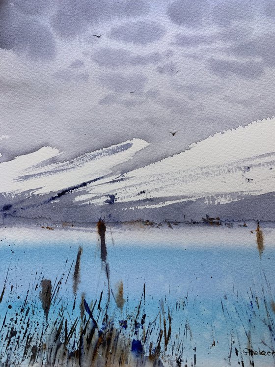 BLUE LAKE IN THE MOUNTAINS