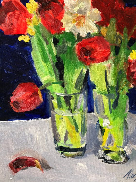 Red Tulips on blue