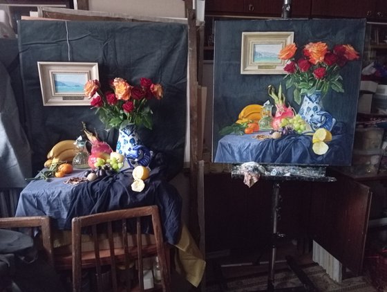 Roses in a ceramic vase and fruits