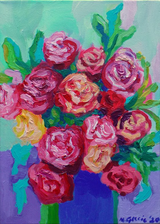 Roses in a blue vase