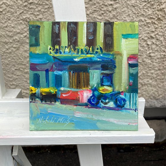 Urban Street Scene- Motorcycle by Restaurant
