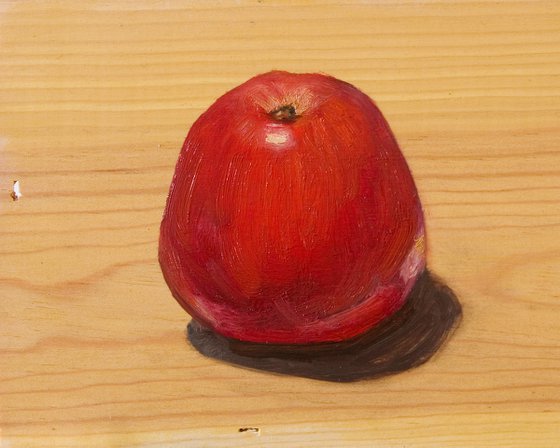 red apple on a wood board for food lovers