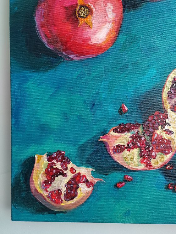 Pomegranate on blue