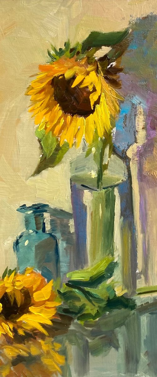 Sunflowers with a dash of blue by Nithya Swaminathan
